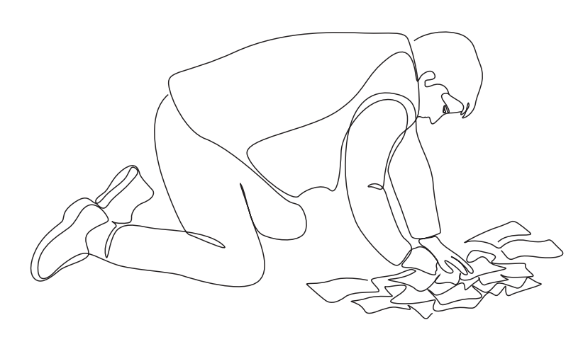 A man looking through some papers.